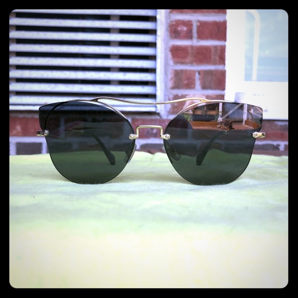 Miu Miu Sunglasses - Picture 1 of 6